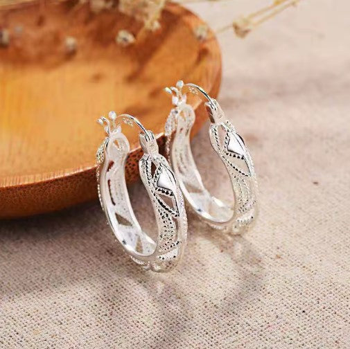 Aurora® | Elegant Hollow Carved Silver Hoop Earrings