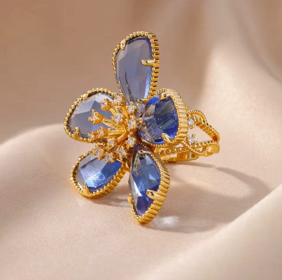 Genevieve® | Blue Zircon Flower Adjustable Ring
