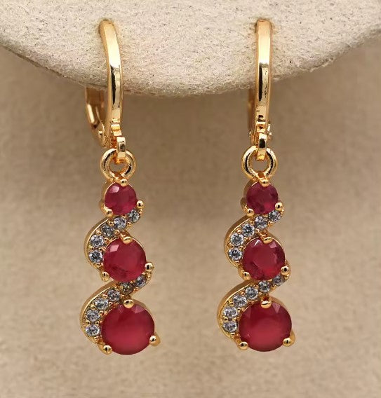 Serena® | Classic Swirl Red Stone Dangle Earrings